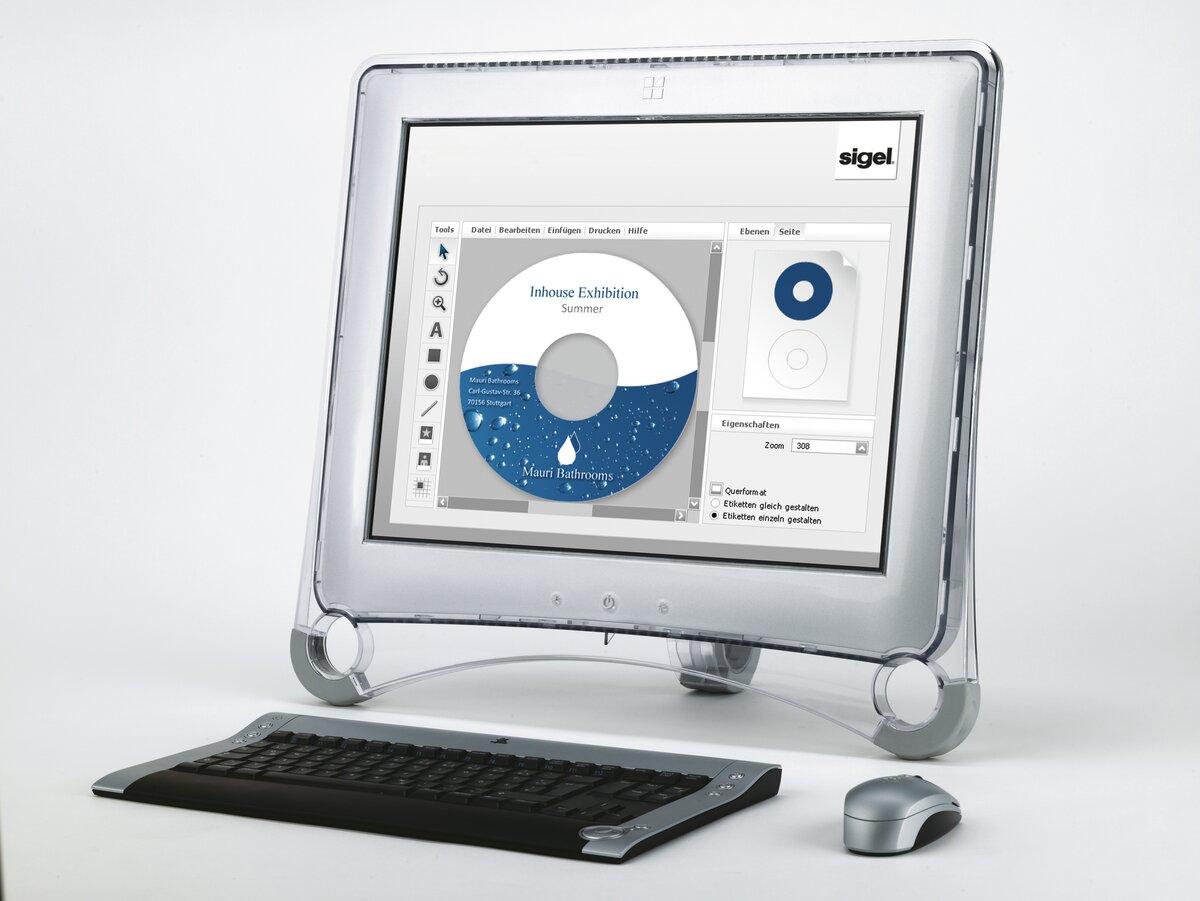 Computer with screen, keyboard and mouse, a diagram design program is open on the monitor