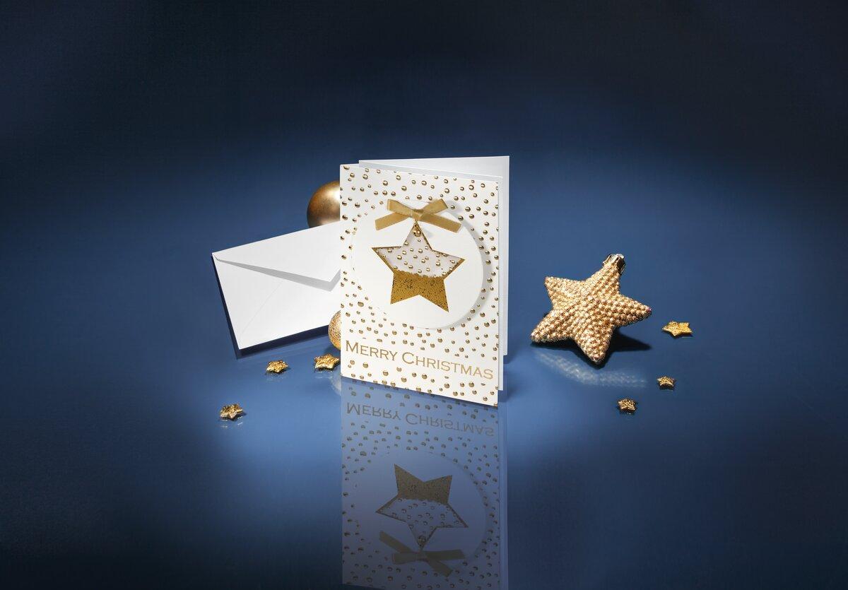 Christmas card with golden stars