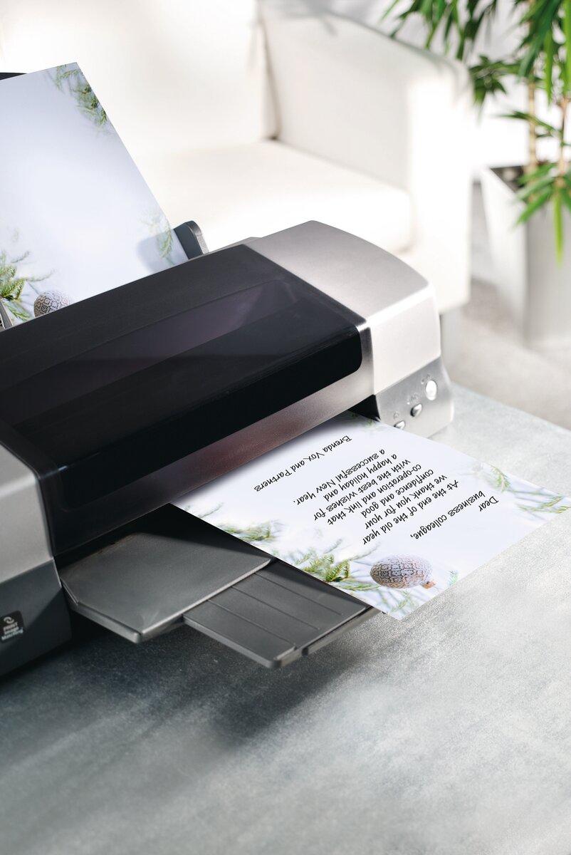 Printer on table, prints text page