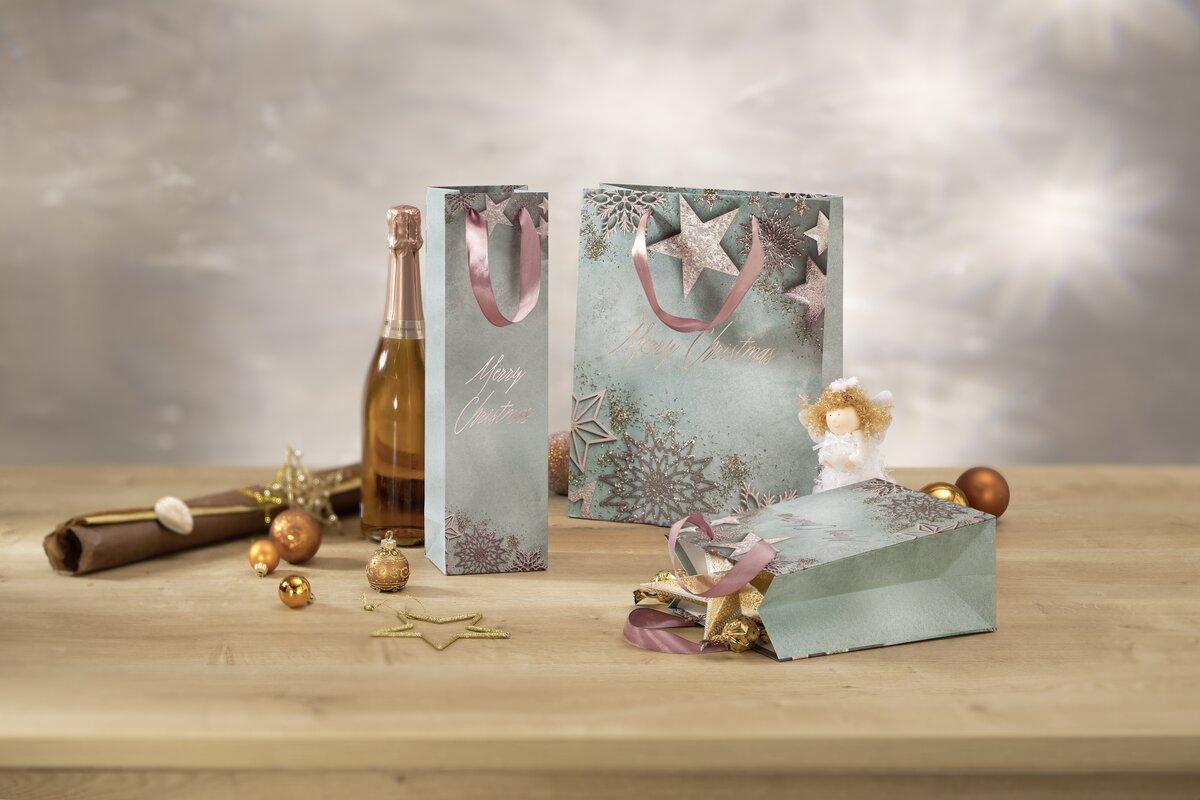 Gift bags, angels, bottle of sparkling wine