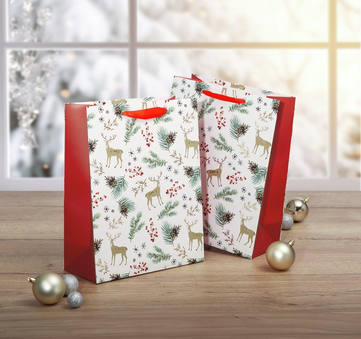 Christmas Bags with Deer Motif Silver and Gold Balls on Wooden Floor