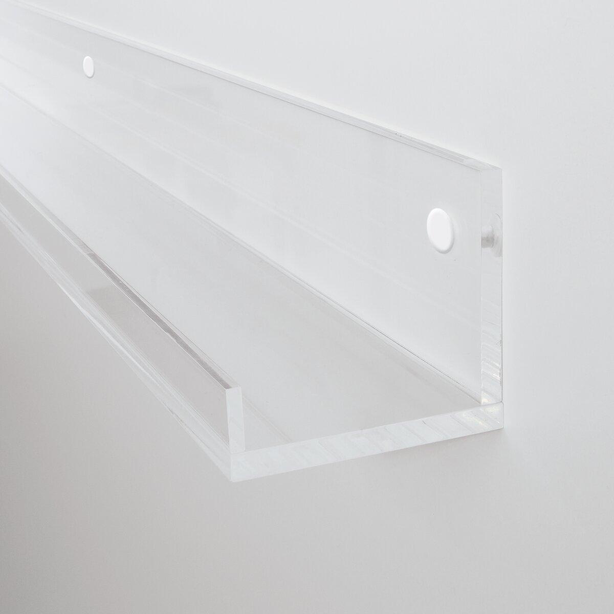 Clear Plastic Shelf on White Wall