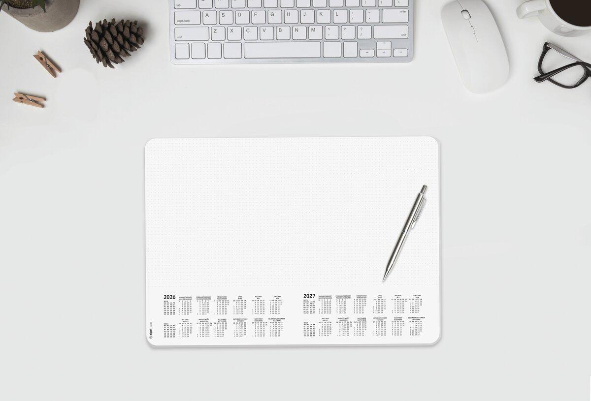 Calendar desk pad with pen, keyboard, mouse, glasses and coffee cup