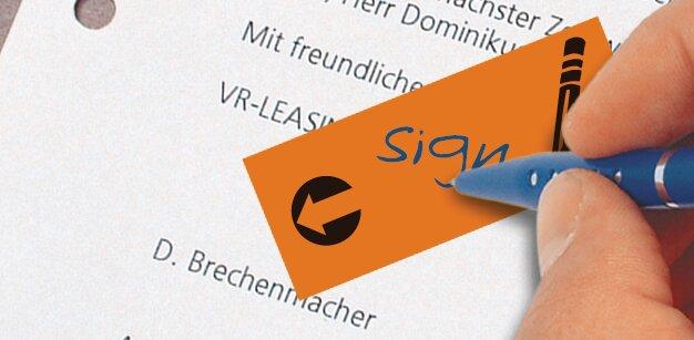 Paper with handwritten signature