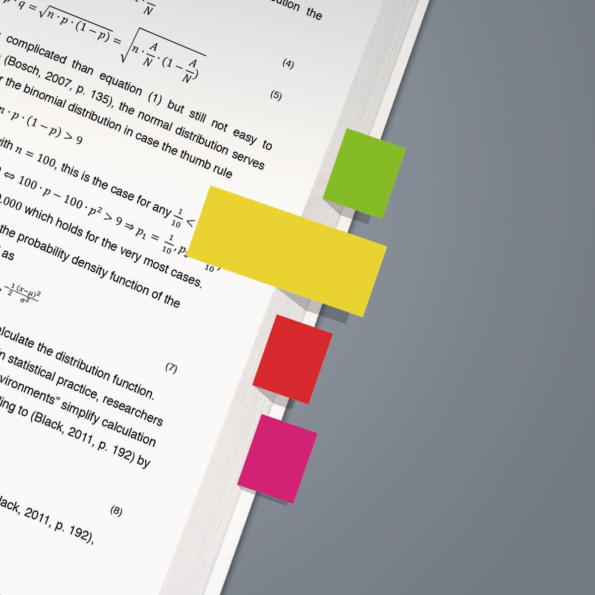 Page with mathematical formulas, four colorful sticky notes