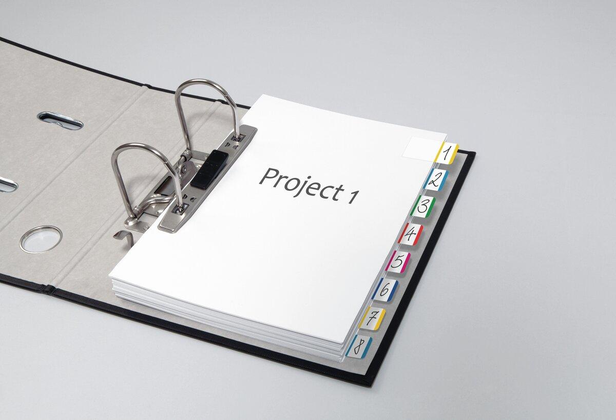 Open folder with Project 1 cover page and tabs 1 through 8