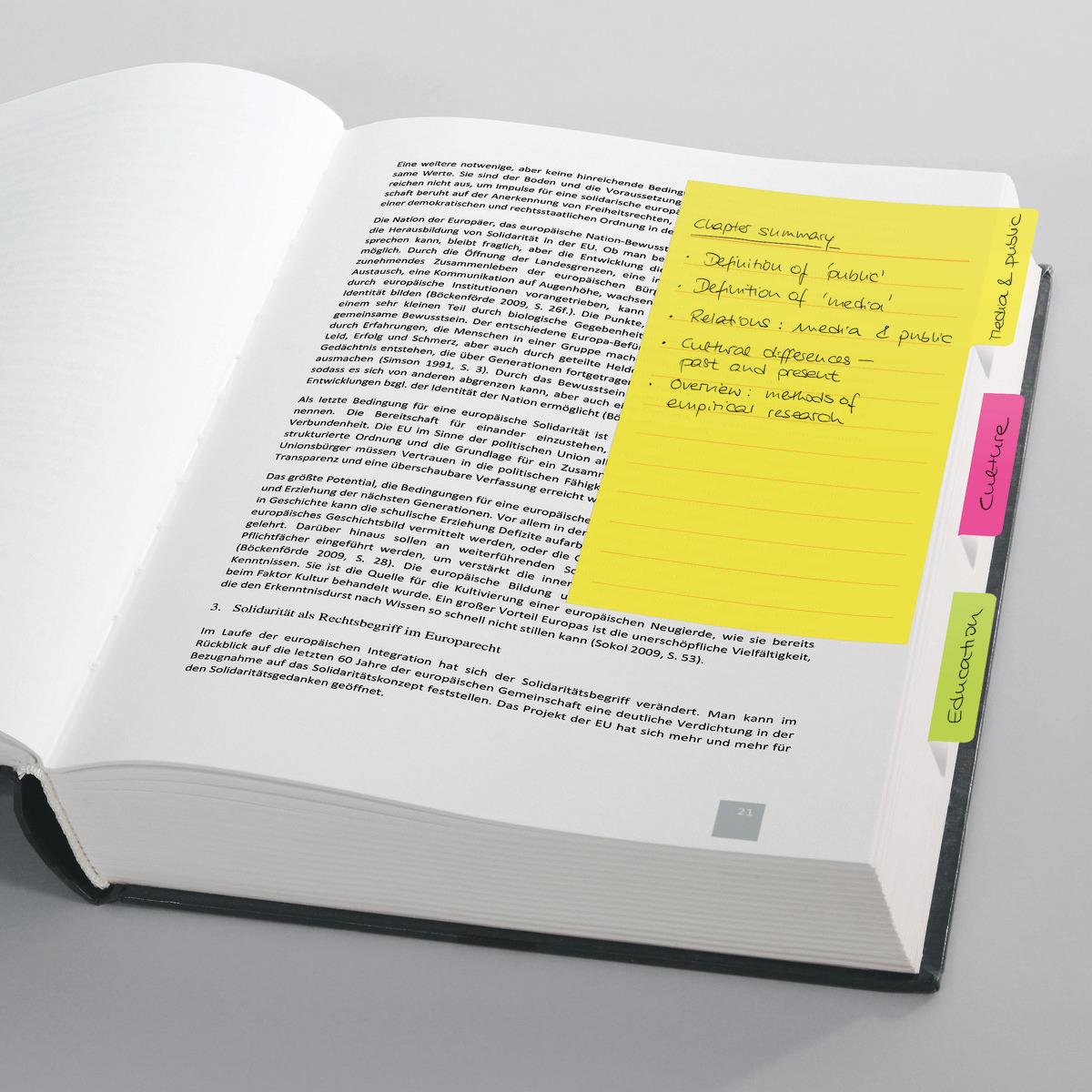 Book with highlighters and notebook