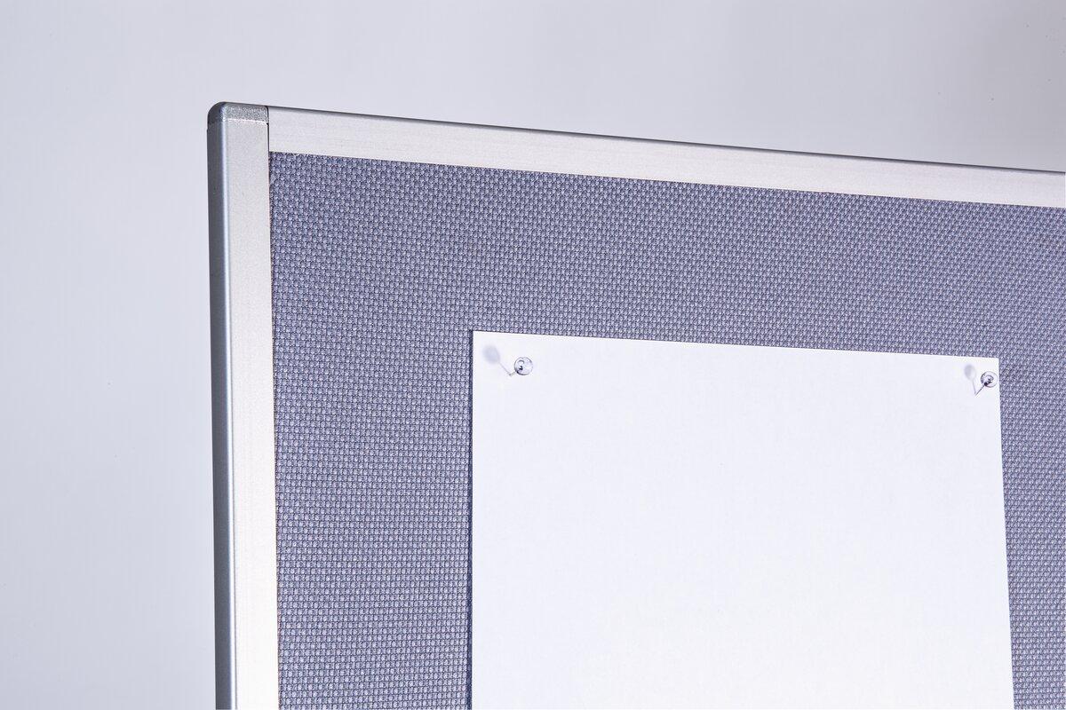 Cork board with paper and pins