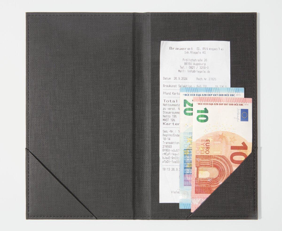 Receipt folder with receipt and euro banknotes