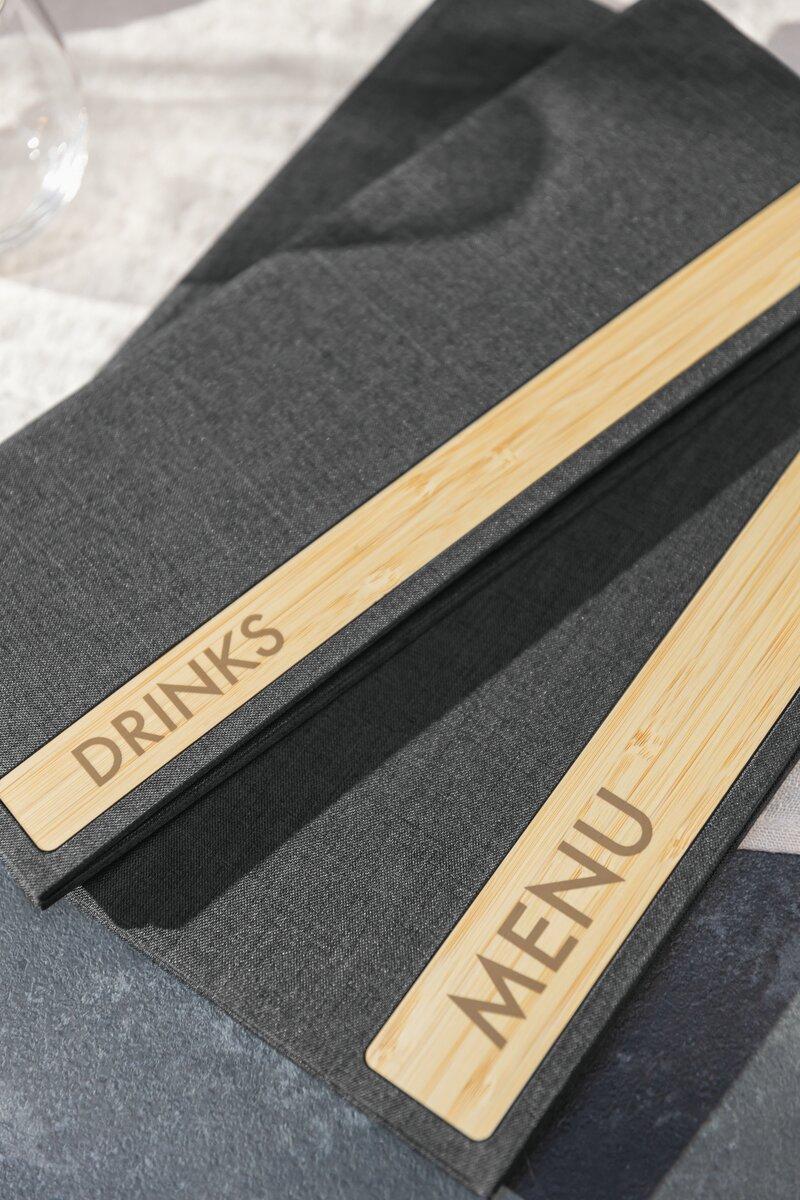 Grey menu cards with wooden strips, labelled DRINKS and MENU