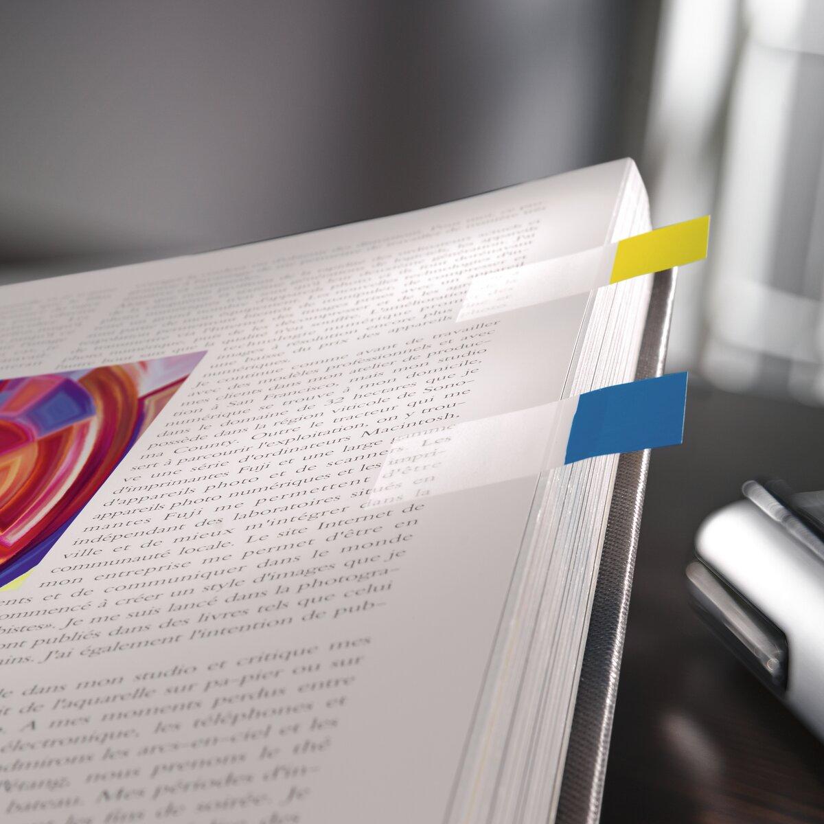 Open book with colorful sticky notes