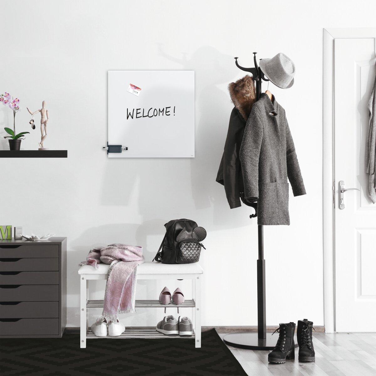 Coat rack with coat, hat and shoes Blackboard Welcome! left