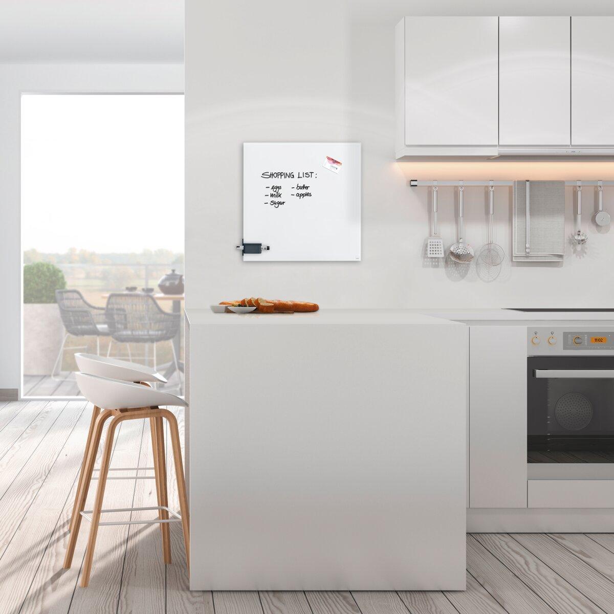 Modern kitchen with island, shopping list on the wall