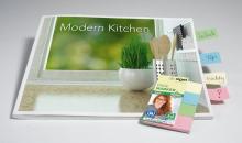 Modern Kitchen cookbook with plant motif, marked with colorful sticky notes