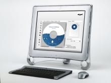 Computer with screen, keyboard and mouse, a diagram design program is open on the monitor