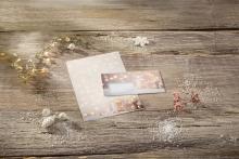 Christmas card on wood with fairy lights