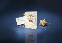 Christmas card with golden stars