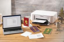 Laptop and printer on desk