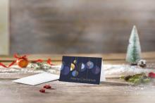 Christmas card with baubles, Christmas tree on the left