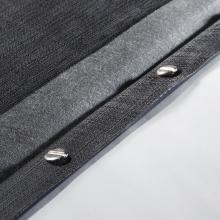 Dark fabric with two screws