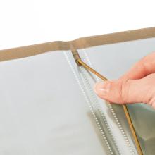 Hand pulls cord through tent loop