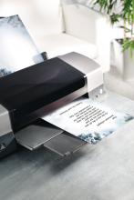 Printer on table, DIN A4 sheet with Christmas text