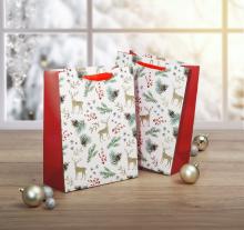 Christmas Bags with Deer Motif Silver and Gold Balls on Wooden Floor