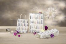 gift bags with fir pattern; purple balls and bows