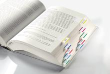 Open book with several coloured tabs on the right side