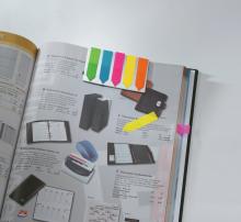 Colorful arrow stickers on catalog page