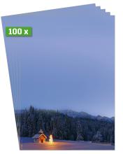 Chapel with illuminated tree, snowy landscape