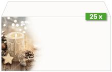 Candle with star relief, pine cones and star biscuit on wooden table; blurred lights in the background