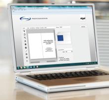 Laptop shows design tool for greeting cards with text Merry Christmas