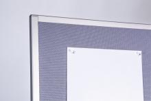 Cork board with paper and pins