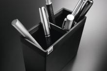 Pen holder with silver pins
