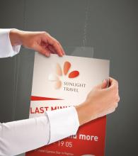 Right hand hangs poster, Sunlight Travel logo visible