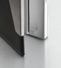 Black and silver metal corner on glossy finish