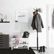 Coat rack with coat, hat and shoes Blackboard Welcome! left