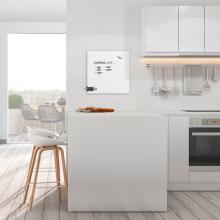 Modern kitchen with island, shopping list on the wall