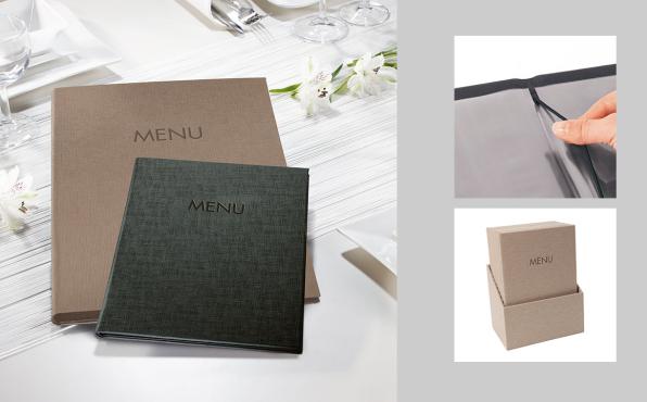 Speiskartenmappen auf schön gedecktem Tisch in Gastronomie